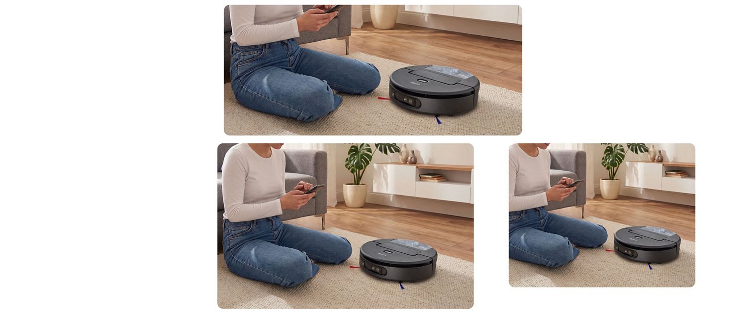 The owner of a Dyson Spot+Scrub Ai robot vacuum uses their phone to book the Dyson Concierge service.